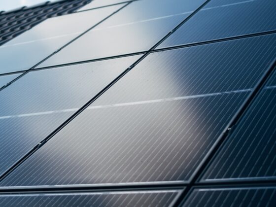 A close up of a solar panel on a building